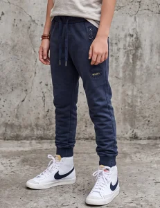 Spodnie dekatyzowane joggery / navy blue HAPPY HOUSE